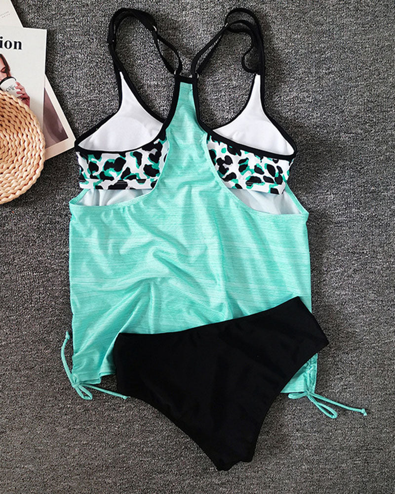 Comfortable women's printed tankini swimsuit, designed with tummy control for stylish & confident summer wear.