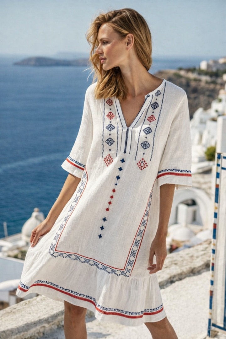 Versatile women's printed V-neck kaftan mini dress, great for summer, resort wear, beach cover-up, or casual outings.