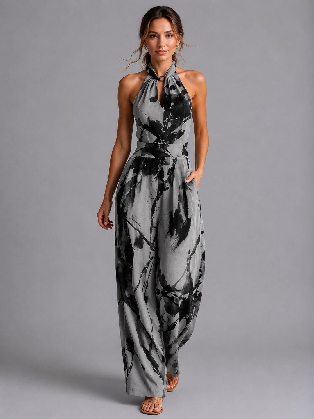 Stylish women's wide-leg printed summer jumpsuit, ideal for vacation outfits, holiday style & casual wear.
