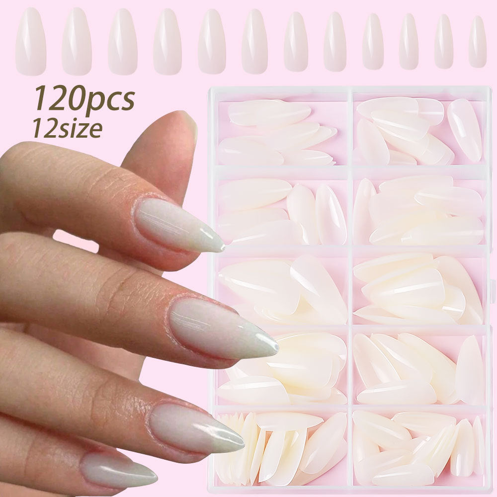 Woman applying professional 120-piece press-on nails for a stunning, quick artificial manicure & nail art look.