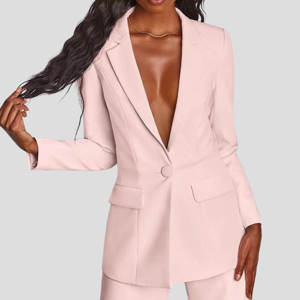Modern women's professional wear: sleek tailored blazer and straight-leg trousers. Office chic.
