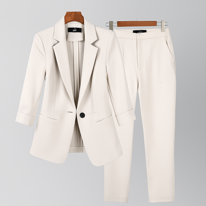 Elegant women's two-piece pants suit for business fashion, professional office attire, and formal workwear.