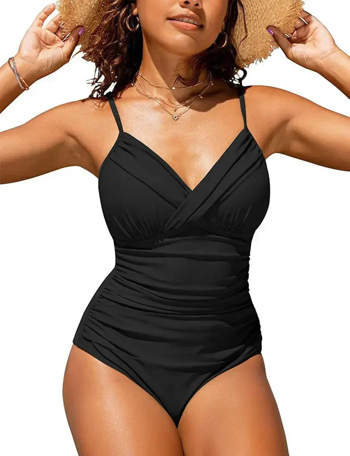 Confident women's push-up V-neck one-piece swimsuit, offering stylish support for beach & pool.