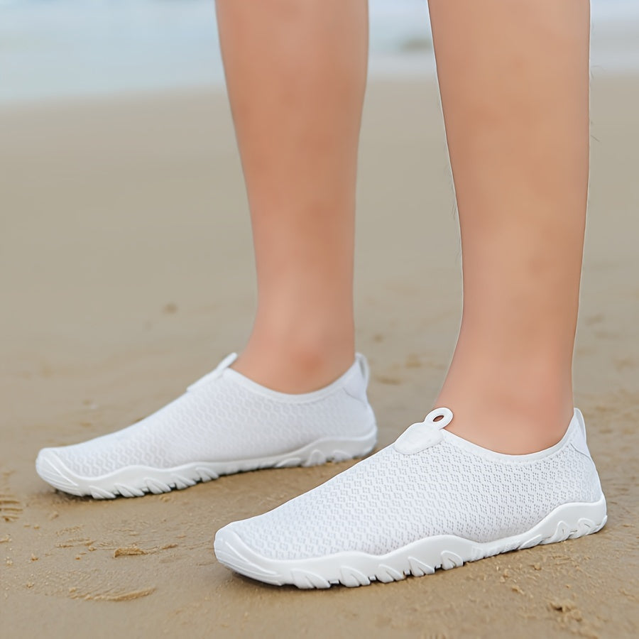 Lightweight, breathable women's water shoes with quick-dry fabric & non-slip sole for aquatic sports.