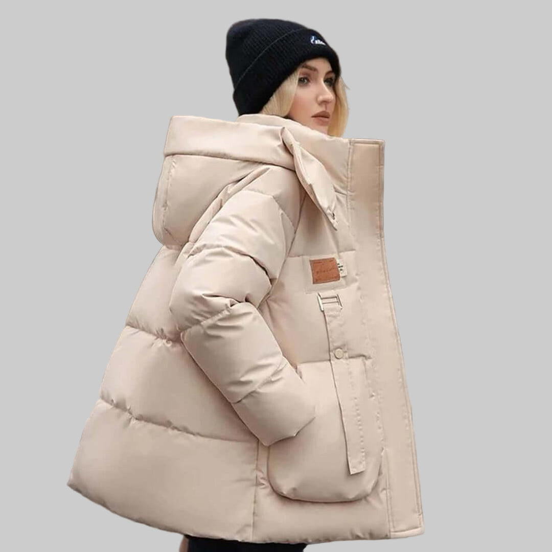Women's quilted hooded jacket, relaxed fit, perfect for everyday comfort & fall fashion. Stylish outerwear.