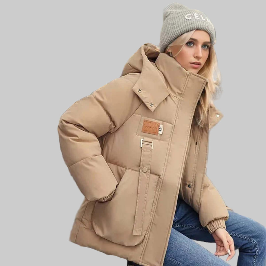 Versatile women's quilted hooded jacket for everyday wear. Casual, comfortable, and stylish fall outerwear.