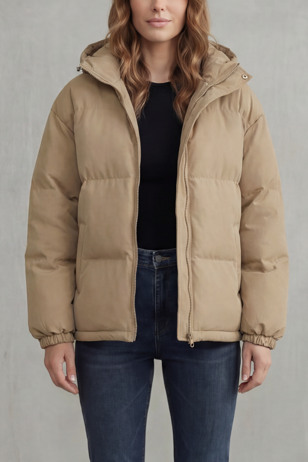 Lightweight women's hooded puffer jacket, quilted for warmth and versatile fall/winter fashion.