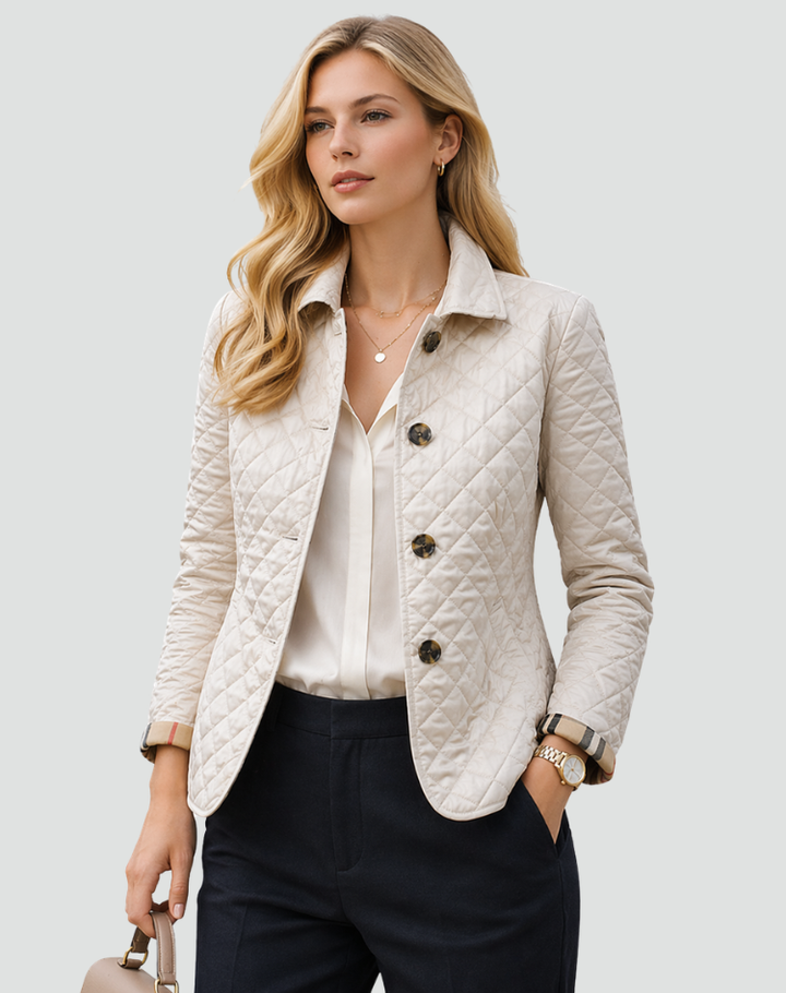 Stylish women's quilted jacket, ideal lightweight outerwear for transitional seasons. Casual button-front coat.
