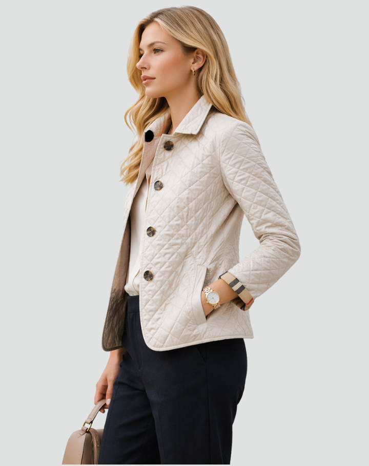 Transitional women's quilted coat. Lightweight design & button front make it essential mid-season outerwear.