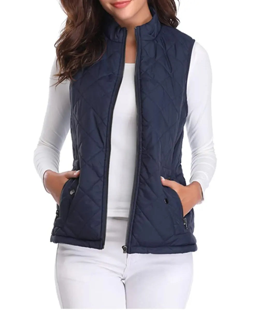 Versatile women's puffer vest, quilted and lightweight for spring & fall layering.