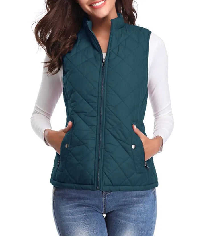 Women's quilted zip-up vest, lightweight puffer style for fashion & comfort.