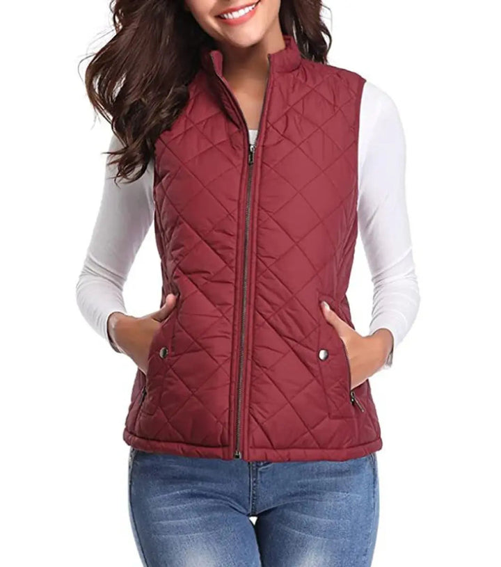 Woman showcasing a versatile zip-up puffer vest, great for layering.