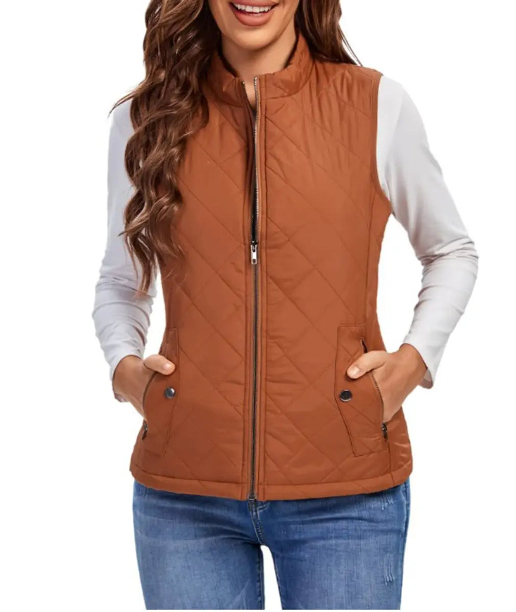 Women's fashion lightweight puffer vest, quilted design with zip closure.