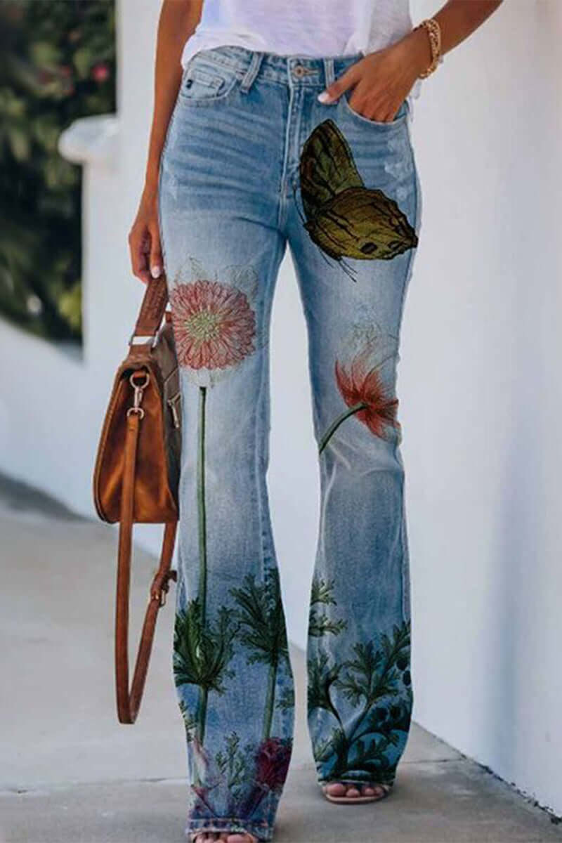 Comfortable women's regular fit jeans, soft blue denim, with stylish floral embroidery. Perfect casual pants.