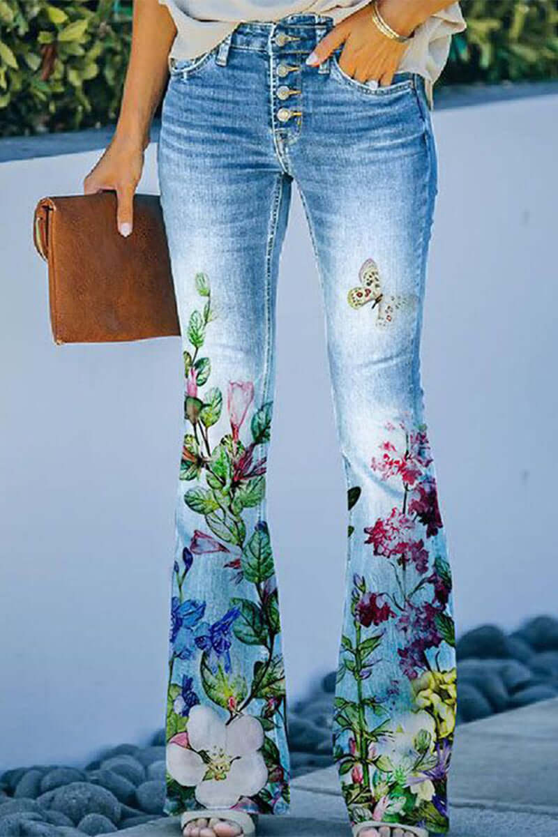 Blue denim women's regular fit jeans featuring intricate floral embroidery. Durable, stylish & comfortable pants.