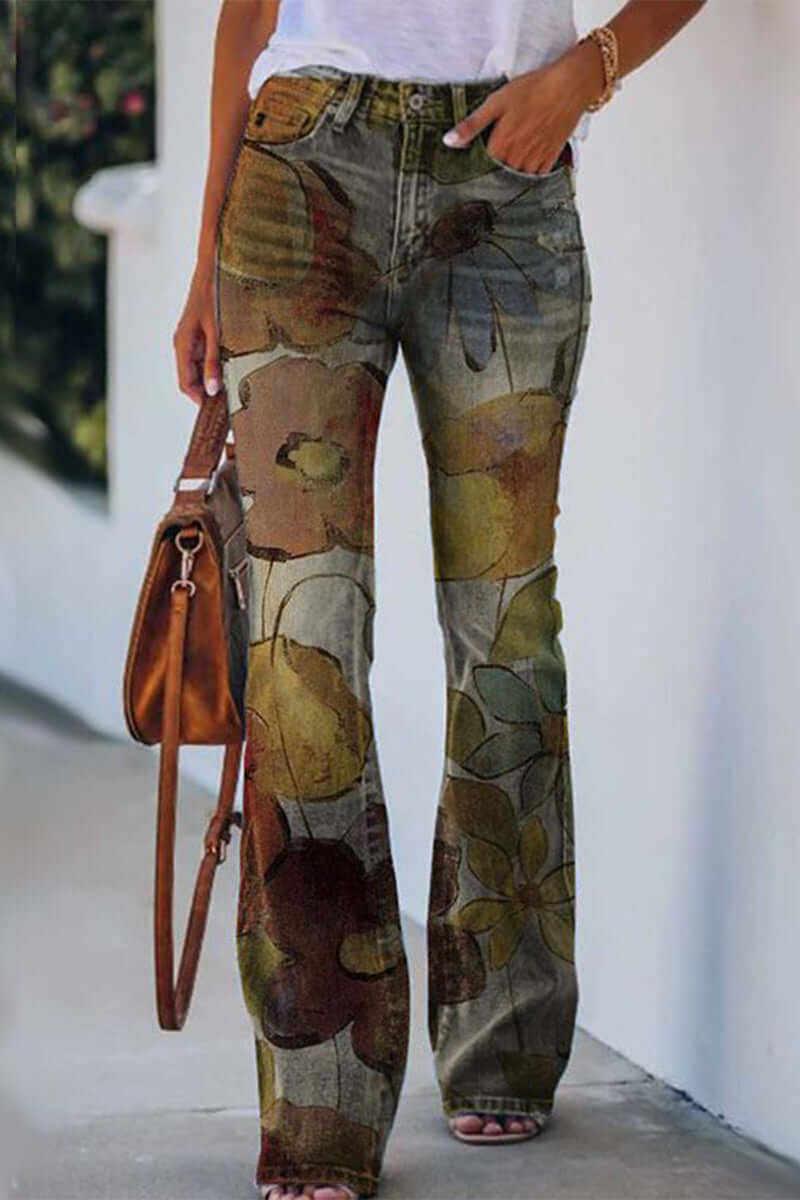 Side view: Women's regular fit jeans, showcasing beautiful floral embroidery detail along the leg. Stylish & unique.