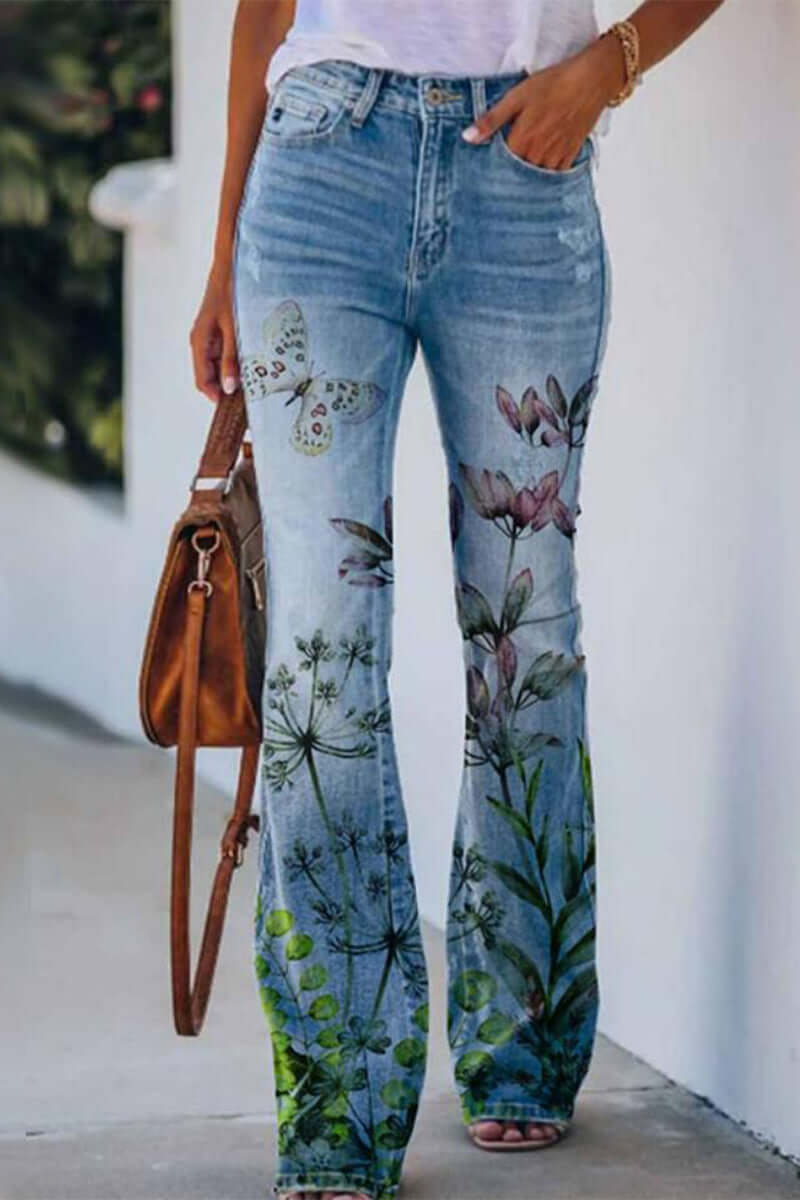 Full shot: Stylish women's floral embroidered regular fit jeans. Unique design combining comfort with a trendy look.