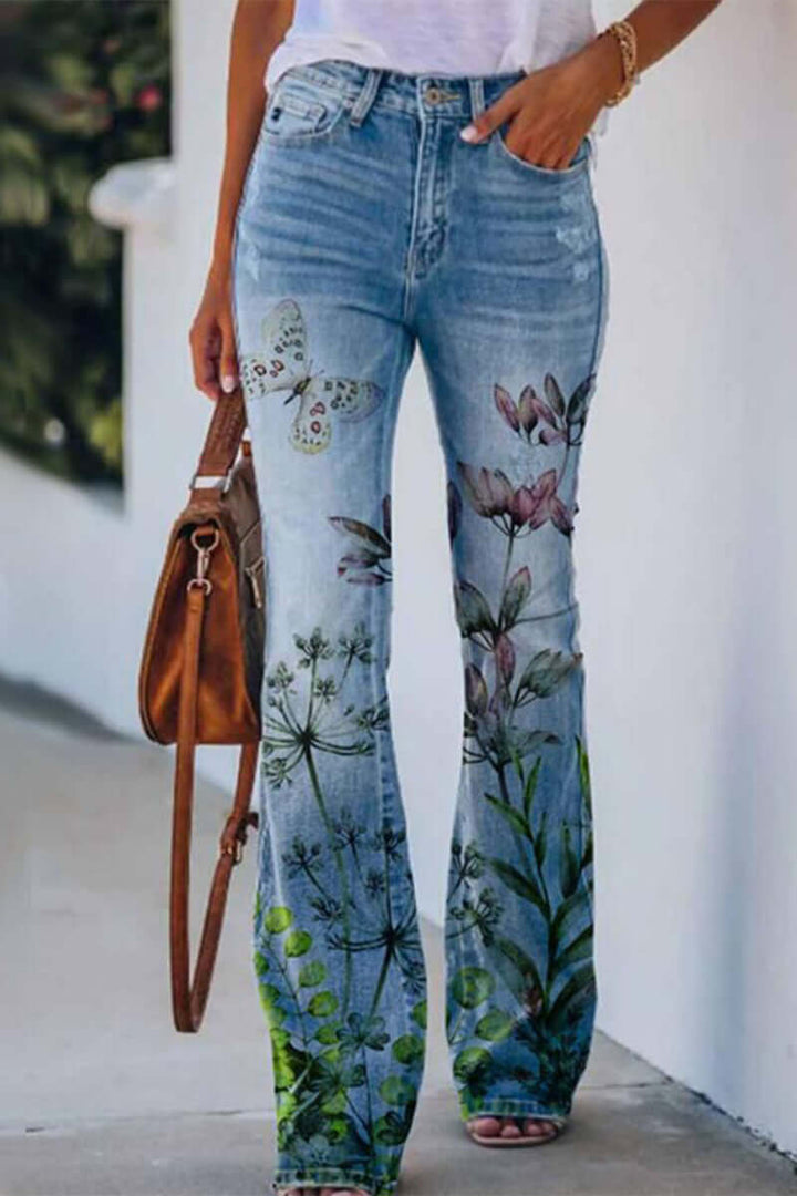 Full shot: Stylish women's floral embroidered regular fit jeans. Unique design combining comfort with a trendy look.