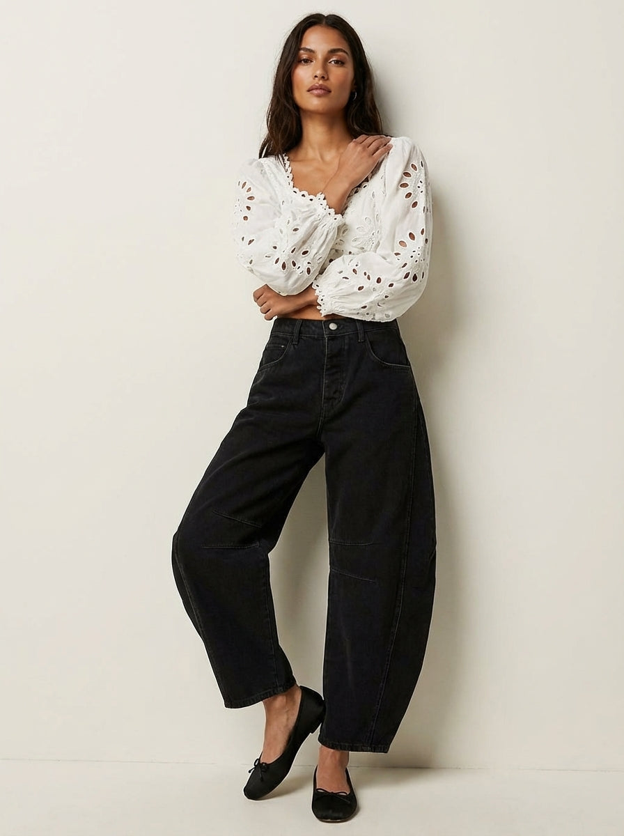 Women's relaxed barrel leg denim jeans with high waist for comfortable, stylish everyday wear.