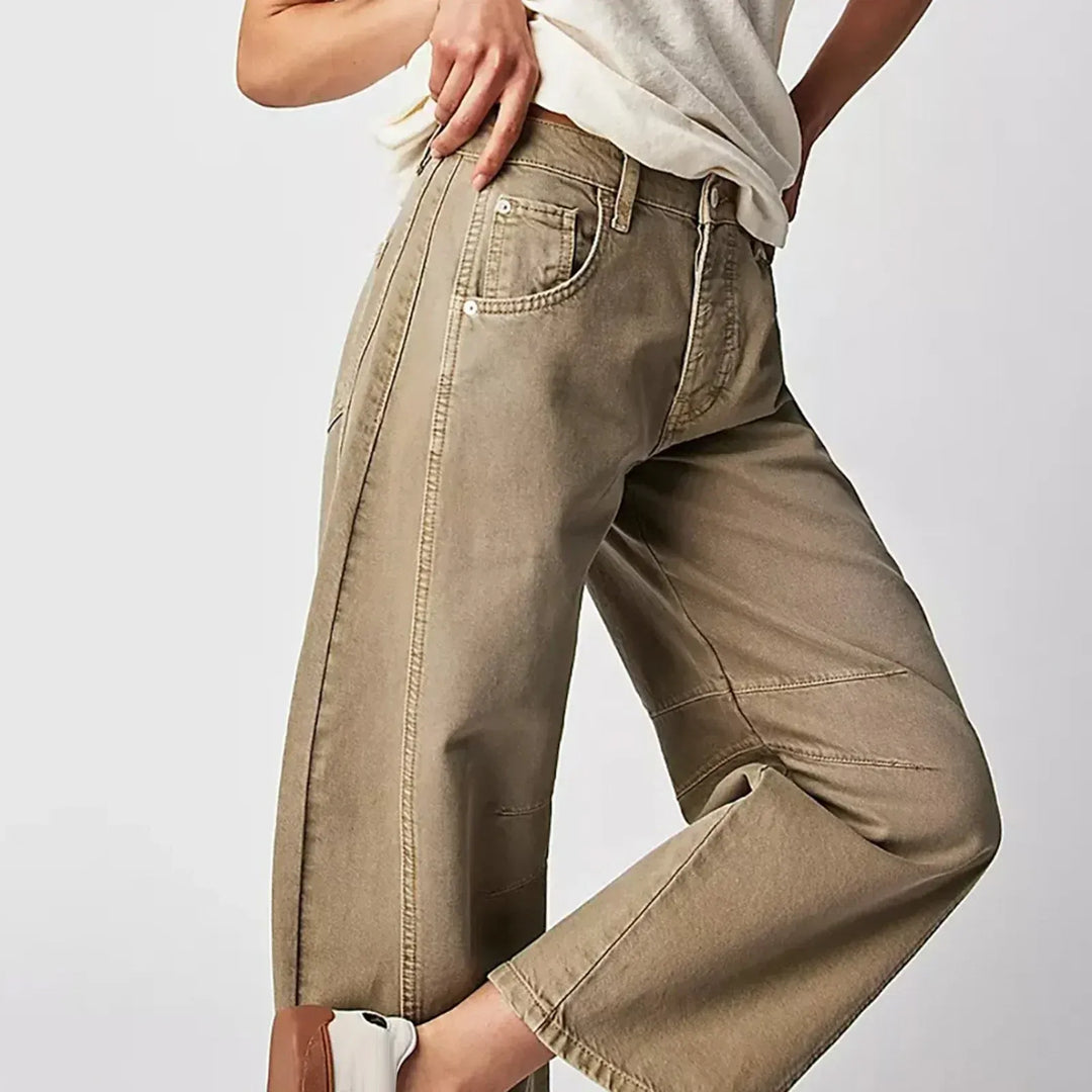 High-waist women's barrel leg denim trousers, offering a relaxed fit for casual fashion.