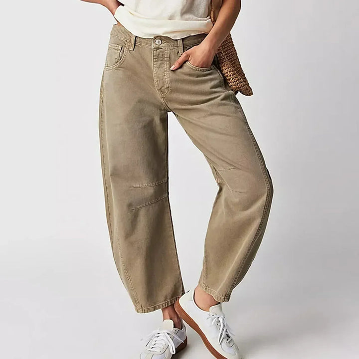 Stylish women's barrel leg jeans with a high waist and relaxed fit for ultimate comfort.