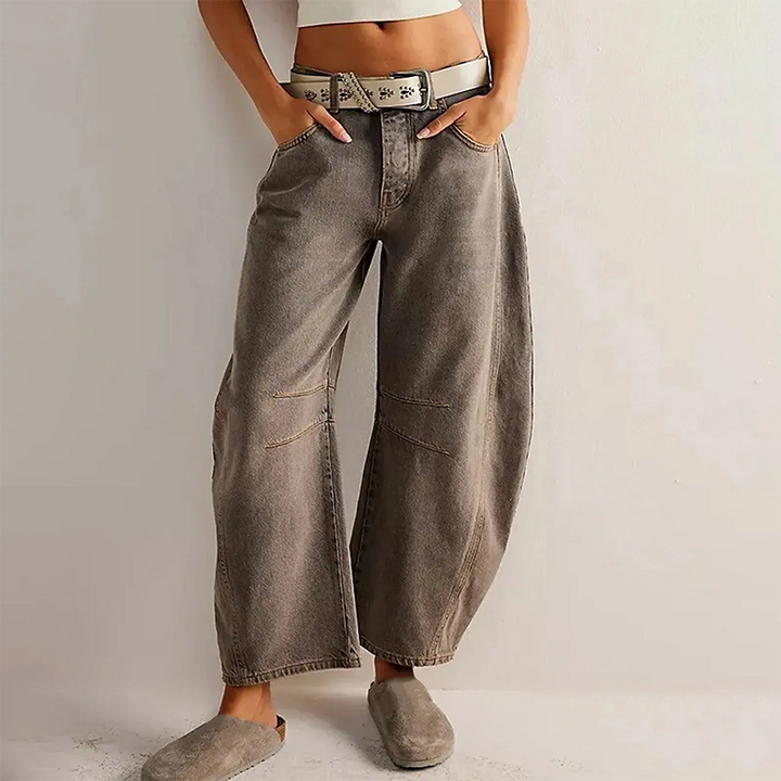 Fashionable women's barrel leg jeans, high waist & relaxed fit denim trousers, perfect for casual everyday wear.
