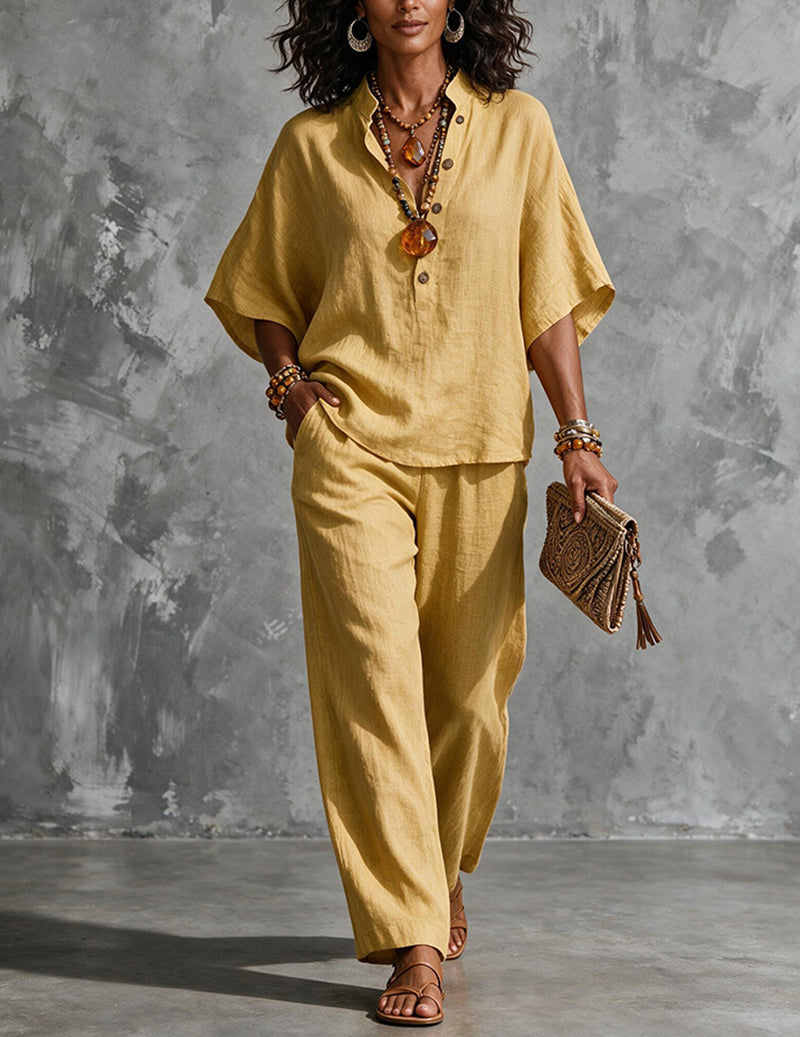 Women's relaxed batwing top & wide-leg pants set. Comfortable two-piece casual outfit for summer vacation.