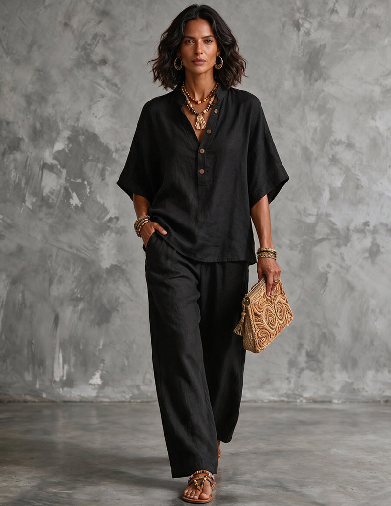 Women's two-piece summer set: Relaxed batwing top & flowing wide-leg pants. Vacation ready.