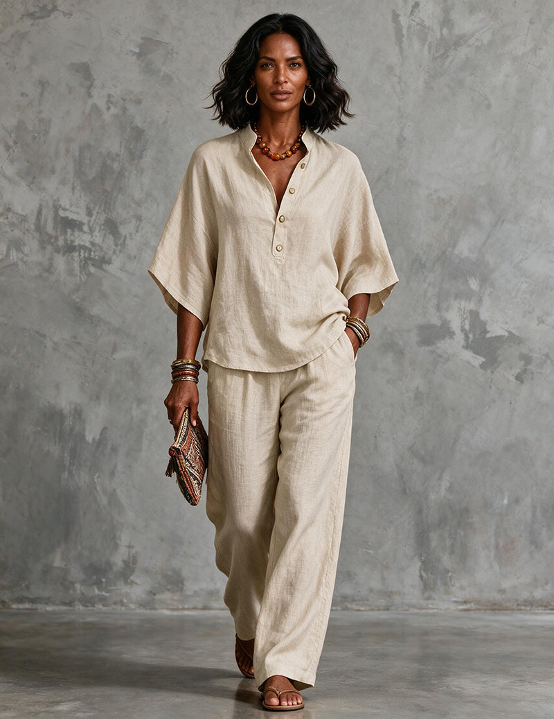 Summer fashion women's two-piece set. Relaxed batwing top & flowy wide-leg pants for elegance.