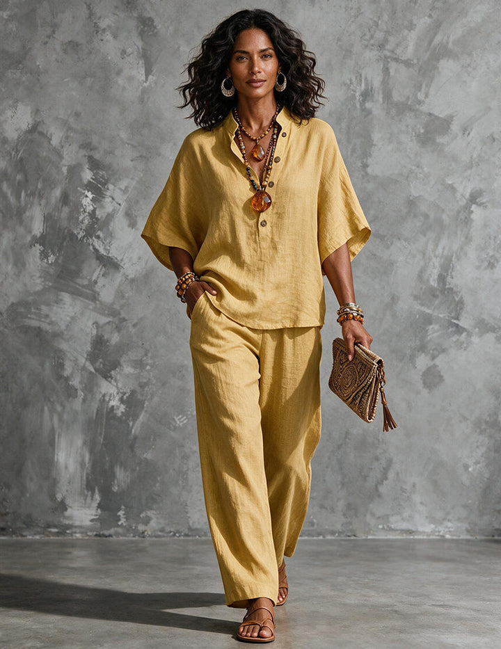 Vacation wear women's batwing top and wide-leg pant set. Effortless style & comfort for travel.