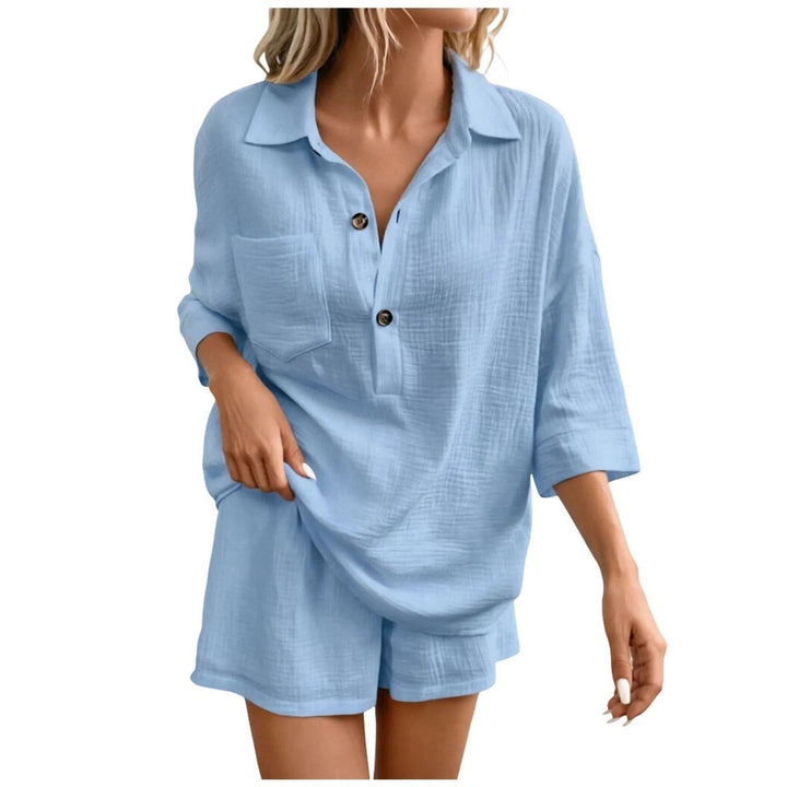 Black women's two-piece relaxed shirt and shorts set for a stylish and comfy summer holiday look.