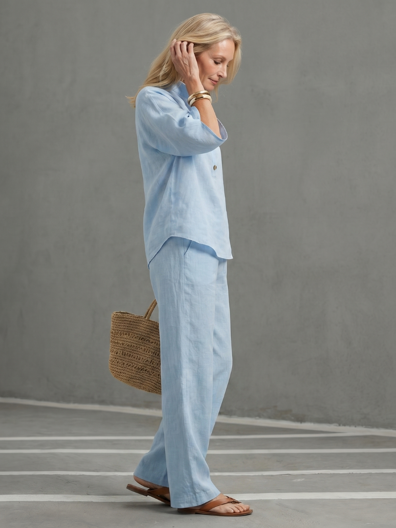 Stylish women's two-piece tunic and trouser set, perfect for spring and summer casual outfits.