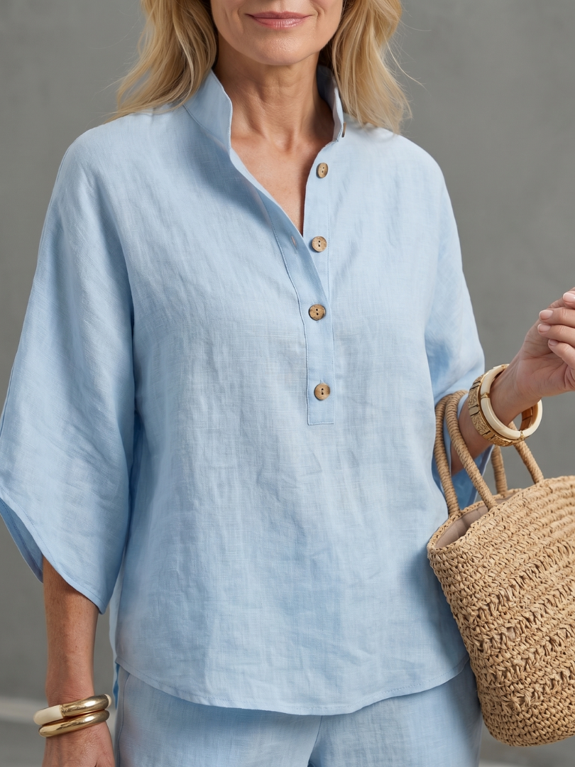 Comfortable women's relaxed fit tunic and trouser set with a classic button front design.