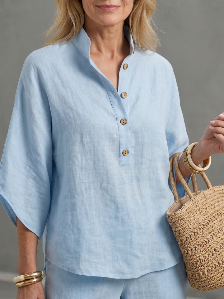 Comfortable women's relaxed fit tunic and trouser set with a classic button front design.