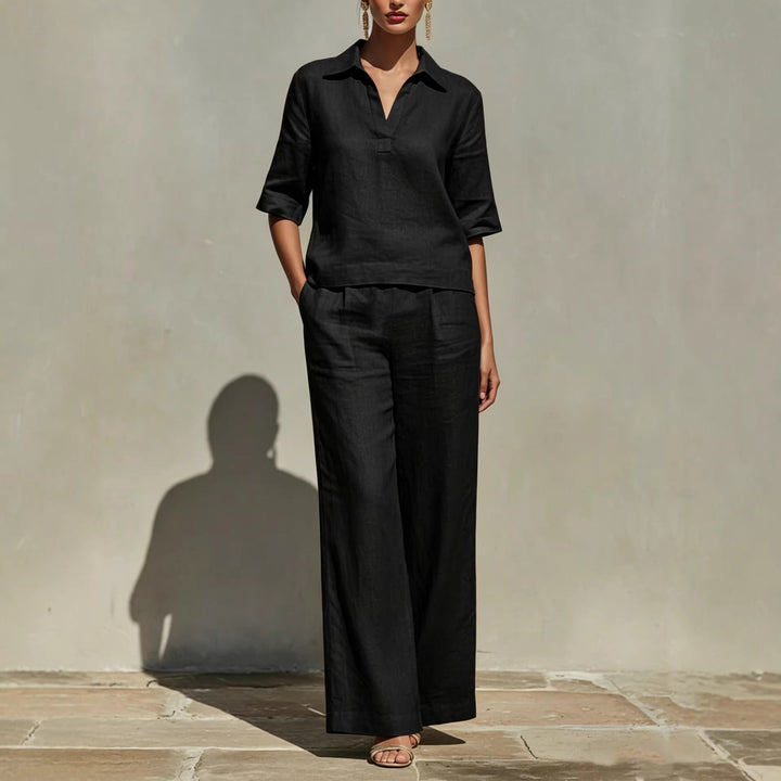 Fashionable women's two-piece set featuring a relaxed collared top & wide-leg trousers for a summer outfit.