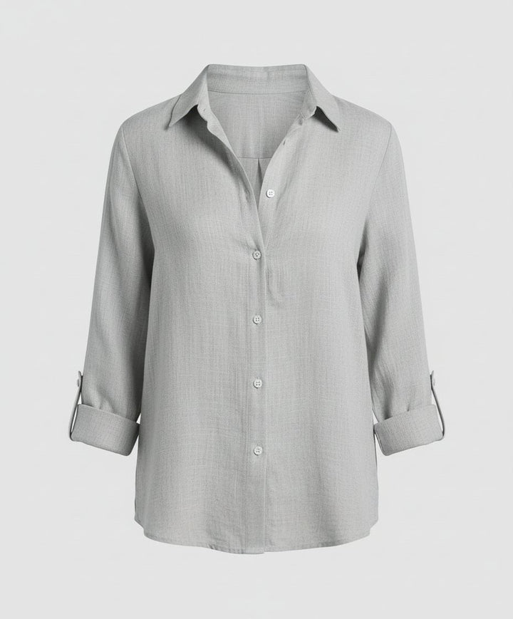 Classic women's three-quarter sleeve relaxed fit shirt, a chic button-up blouse for smart casual clothing.