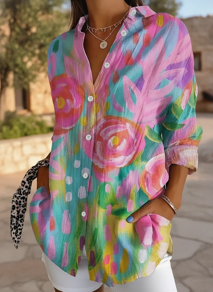 Women's relaxed fit abstract print blouse. Colorful long sleeve top perfect for casual summer style or everyday wear.