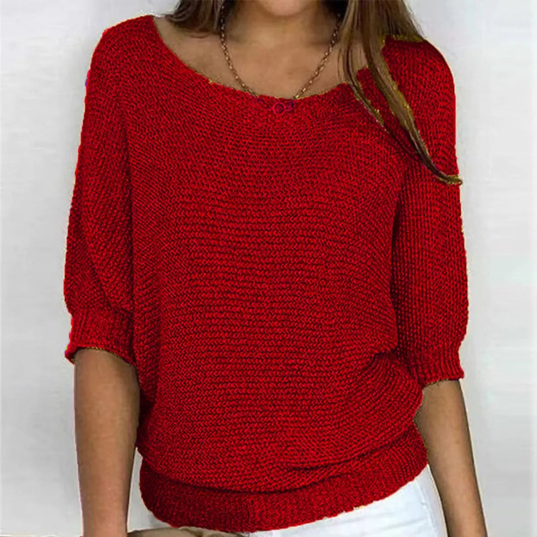 Chic women's batwing-sleeve comfort sweater with a relaxed fit. Perfect for stylish everyday wear.