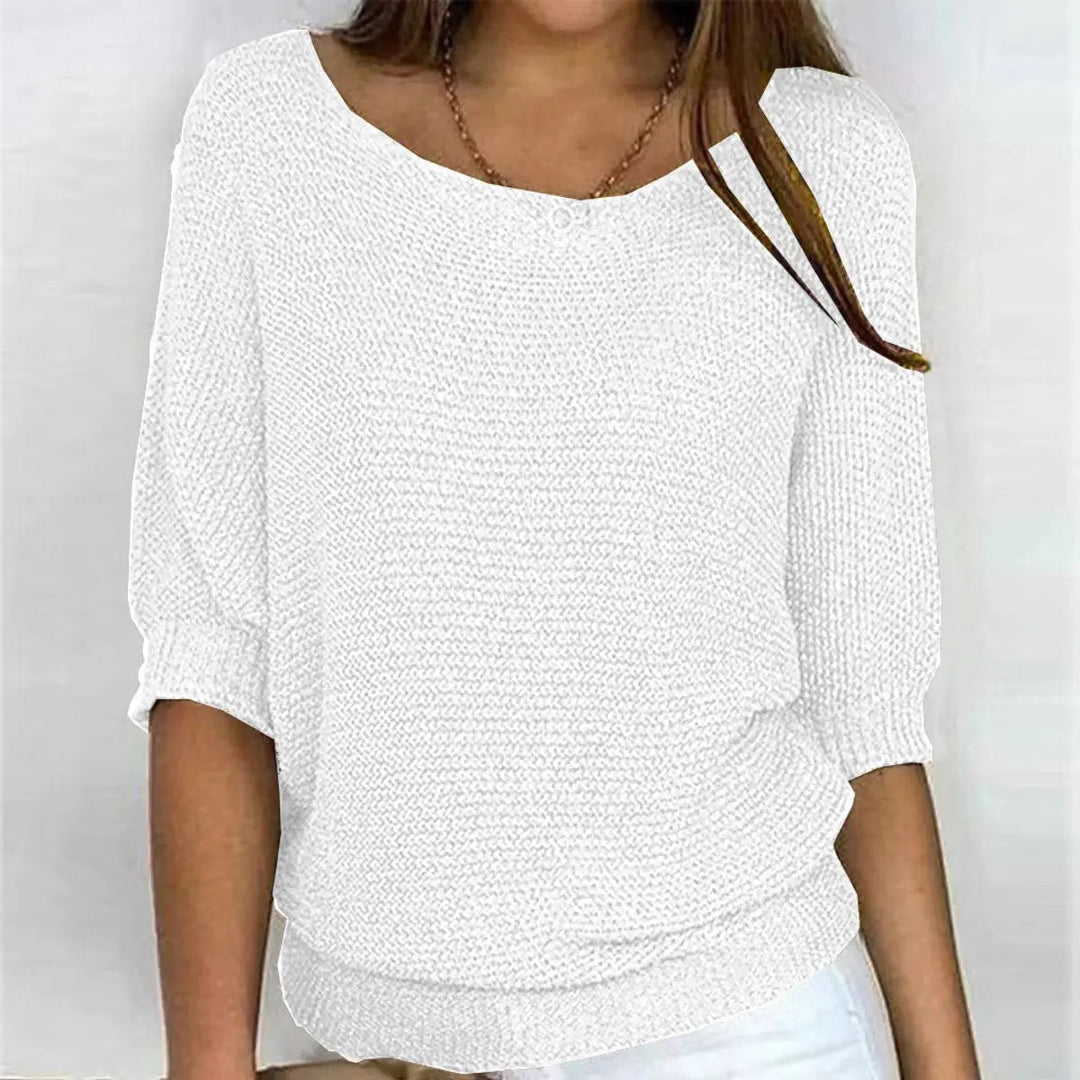 Versatile women's batwing-sleeve sweater, relaxed fit. An essential comfort top for any casual look.