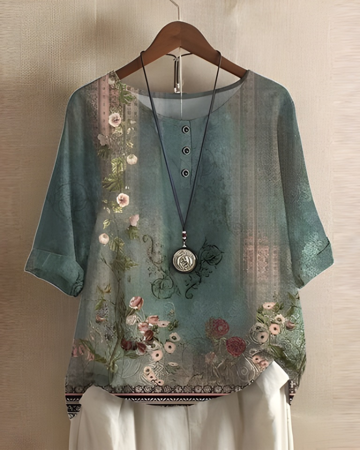 Short sleeve women's boho summer top, relaxed fit, vibrant print. Perfect for warm weather casual fashion.