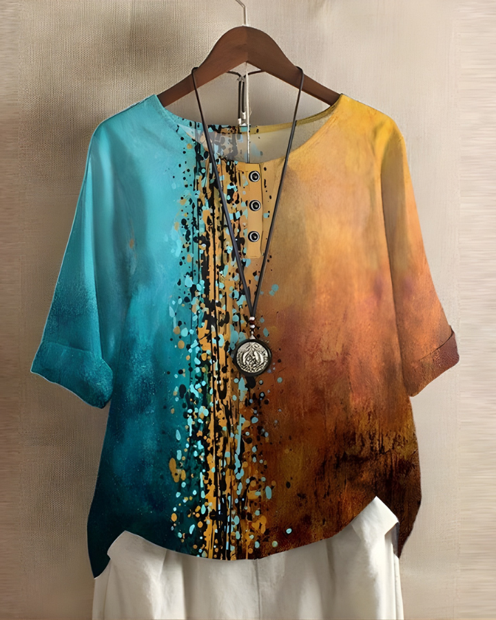 Womens apparel: vibrant print boho summer top, relaxed fit, short sleeve. For casual everyday fashion.