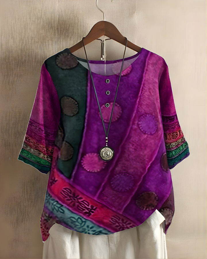 Comfortable women's relaxed fit summer top, vibrant boho print. Ideal short sleeve for everyday casual wear.