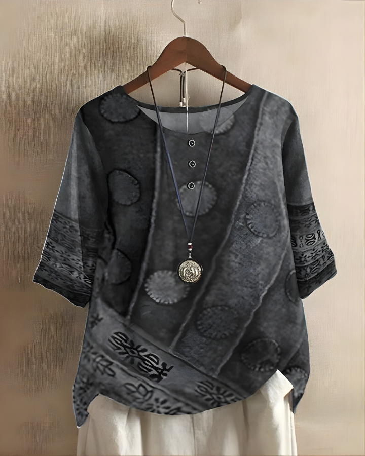 Vibrant printed women's boho summer top, relaxed fit, short sleeve. Great for casual bohemian style.