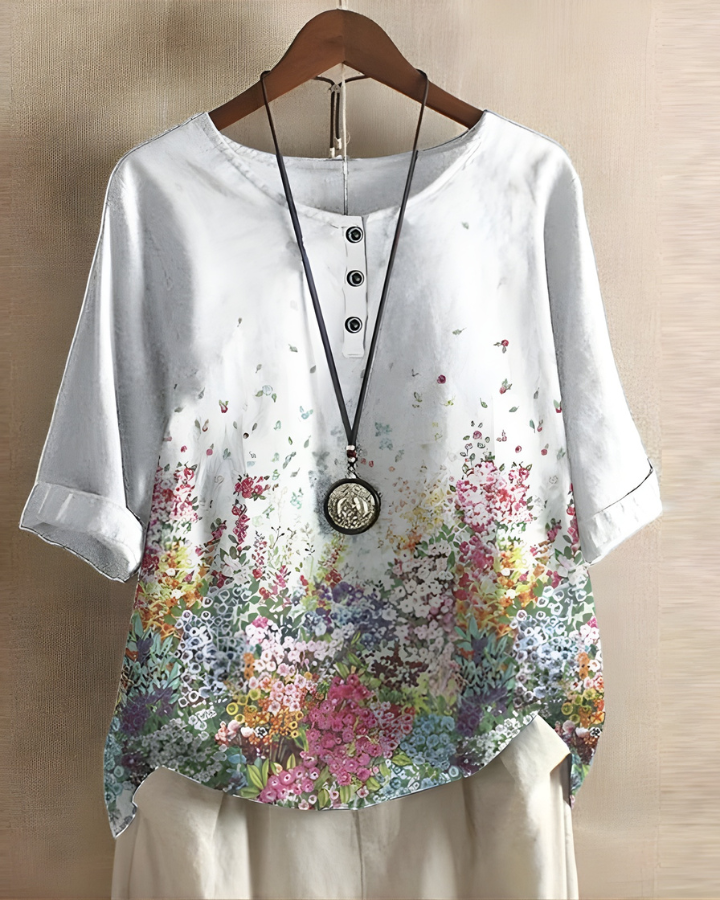 Casual women's relaxed fit boho summer top with a vibrant print. Great for everyday fashion & warm weather.