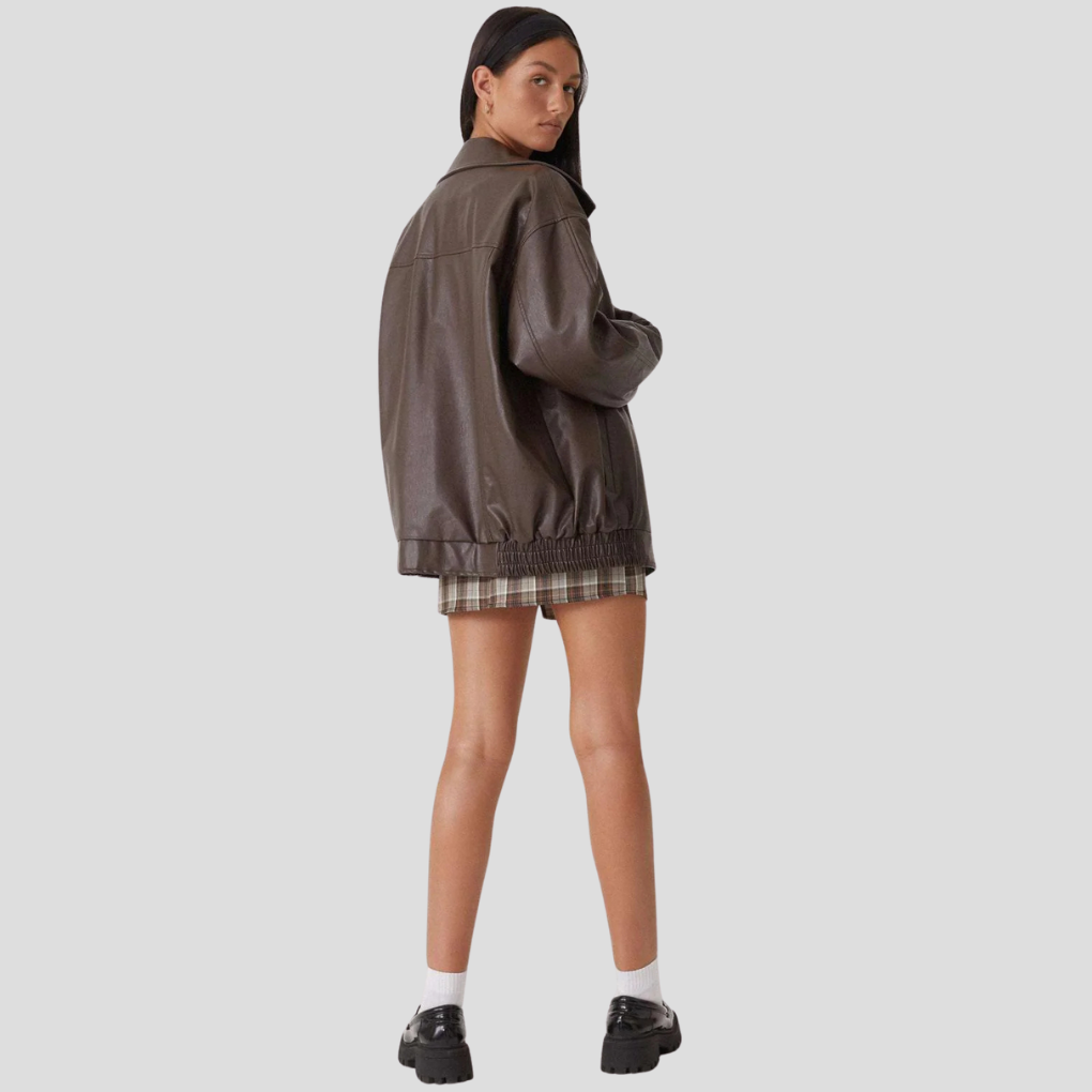 Stylish brown relaxed-fit jacket for women. Versatile layering piece for modern, effortless everyday fashion.