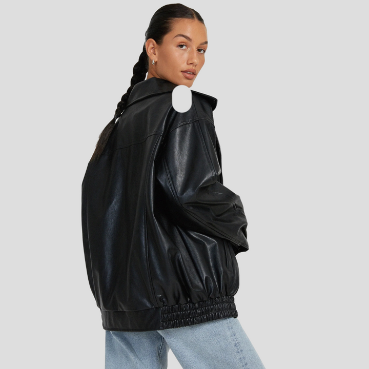 Modern relaxed-fit women's jacket in stylish brown. Loose-fit outerwear, perfect for chic casual looks.