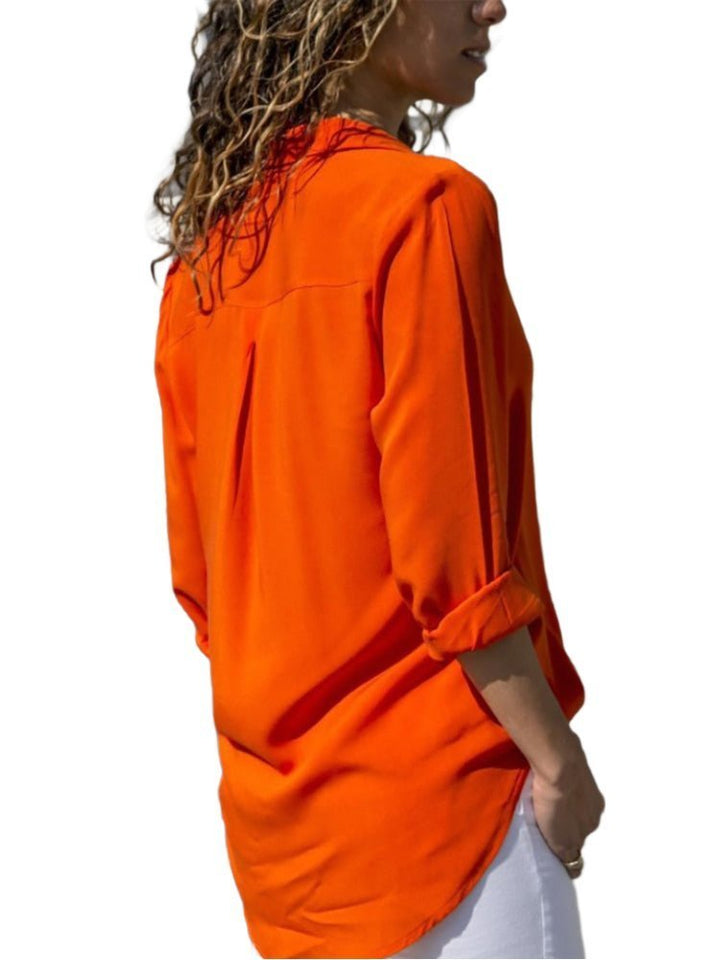 Casual chic women's long sleeve button-down blouse, relaxed fit with functional roll-up sleeves for office or weekend.