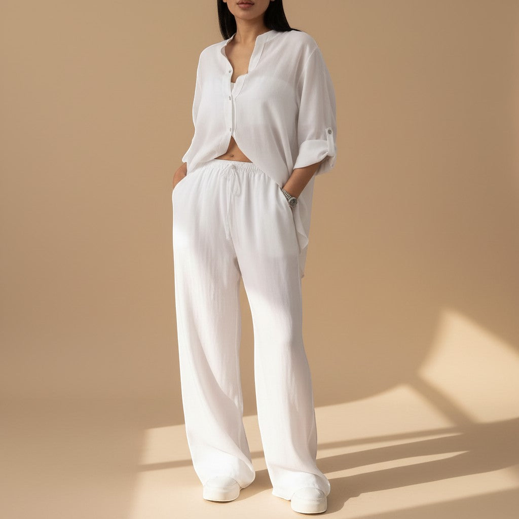 Women's relaxed fit button-down shirt & wide-leg pants matching set. Perfect for lounge or casual wear.