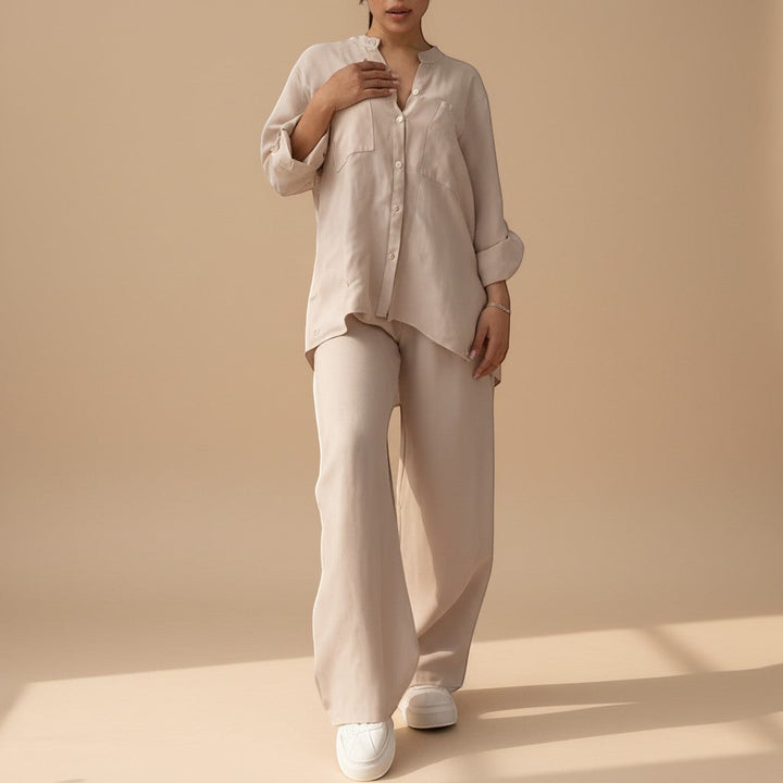 Effortlessly stylish women's lounge set featuring a relaxed button-down top and comfortable wide-leg bottoms.