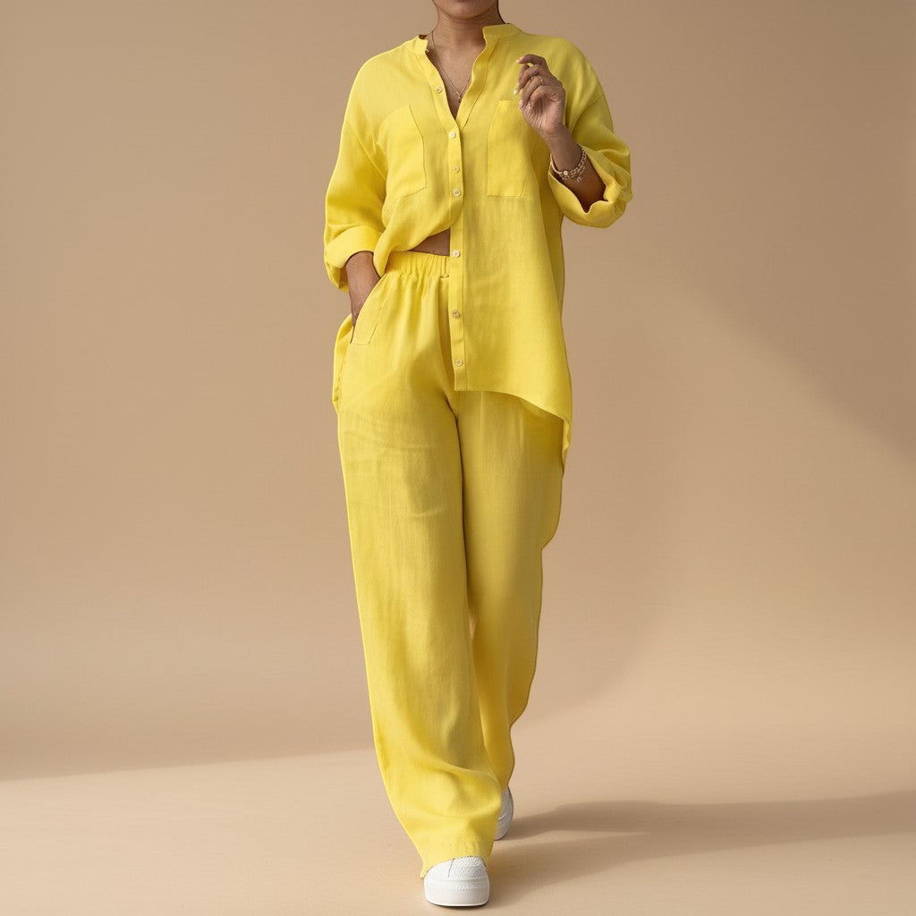 Relaxed fit women's button-down shirt and wide-leg pant combo. A comfortable two-piece set for any occasion.